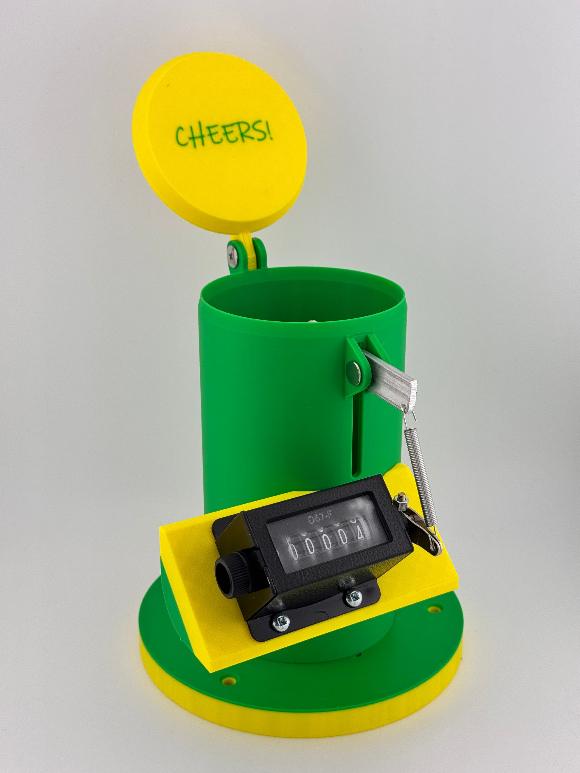 A John Deere themed beer can counter with a green base, yellow top, and a digital count display.